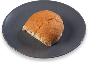 Wholemeal bap on plate Wholemeal bap on plate