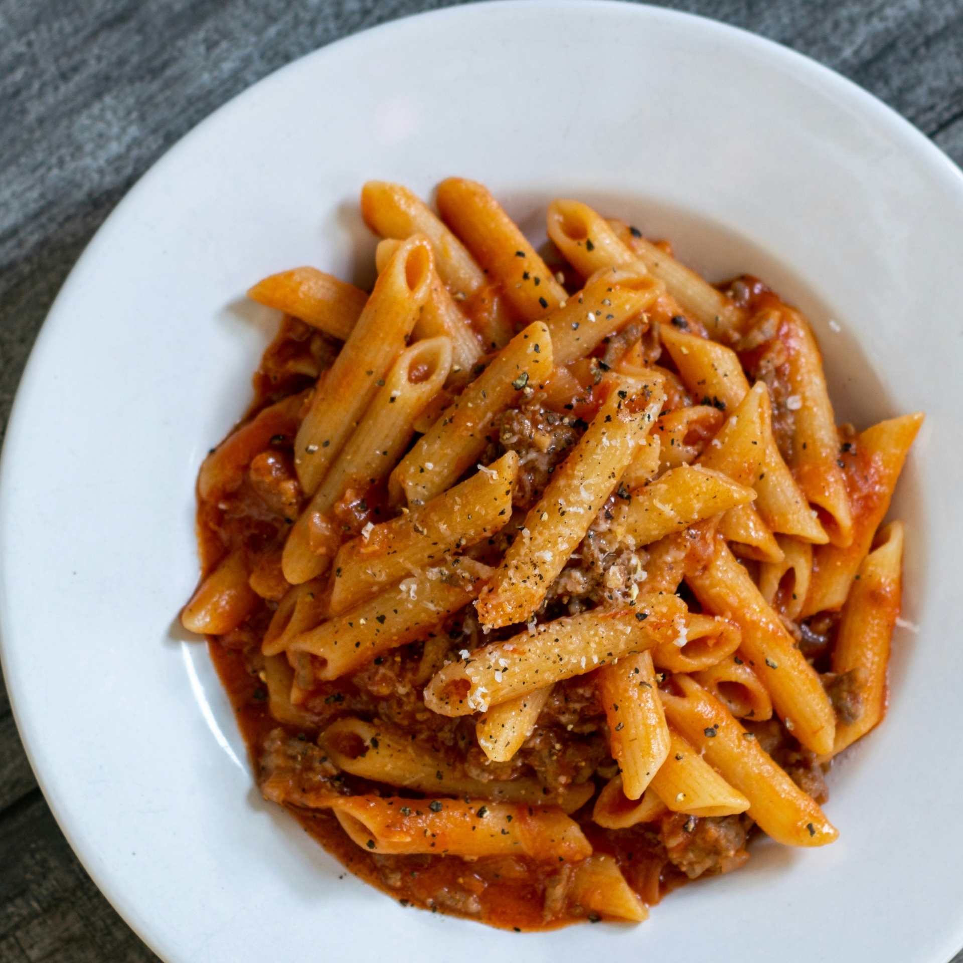 How many carbs in pasta. A dish of homemade penne pasta.
